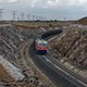 Transporting ballast used in the construction of the SGR.